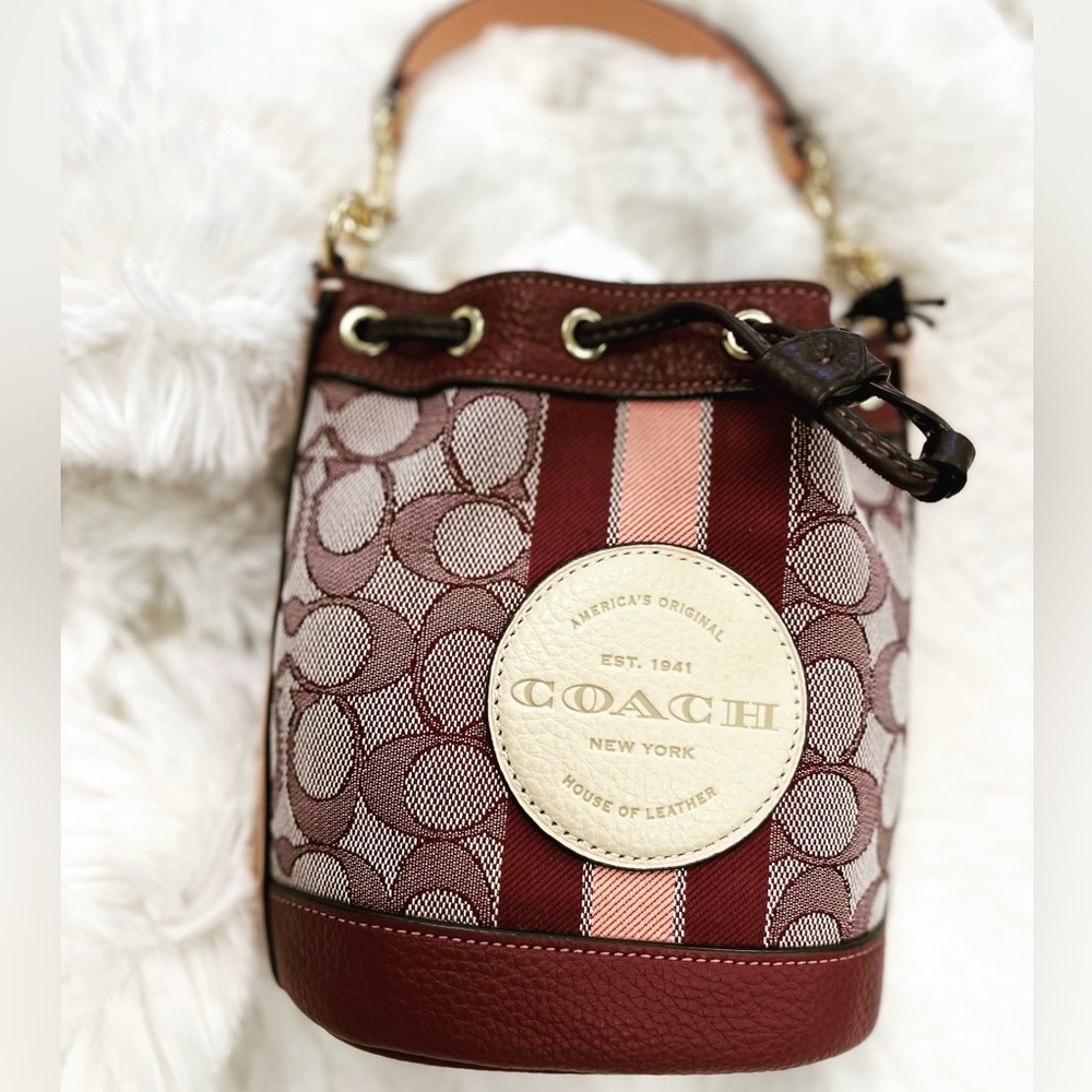 Coach - Dempsey mini crossbody.